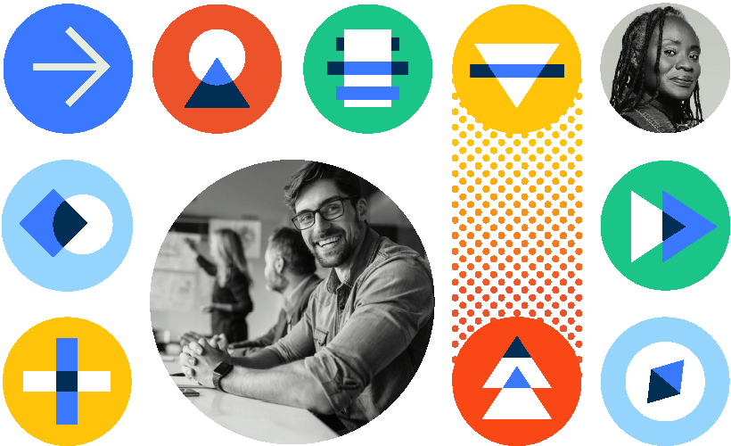 Black-and-white image of a smiling person seated at a table with a blurred background of people in discussion. Surrounded by colorful, abstract geometric icons in a circle arrangement.